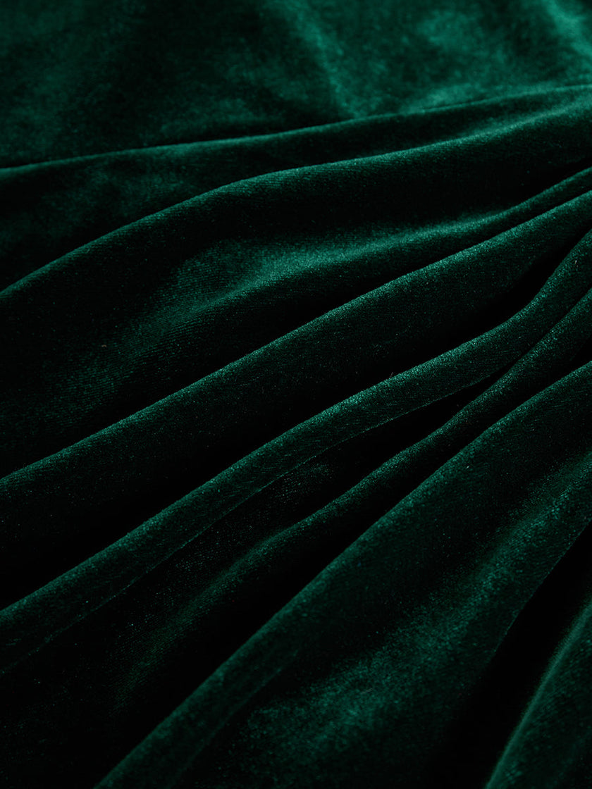 FJØRNA velvet midi evening dress with elegant drape and long sleeves, displayed on a mannequin.