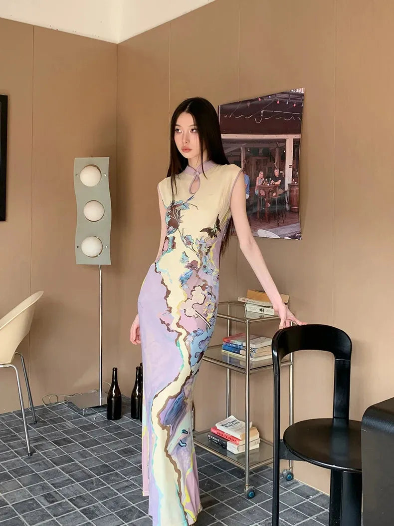 FJØRNA vintage floral cut-out women's maxi dress showcasing a flowy silhouette with intricate floral patterns and cut-out details.