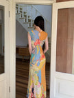 FJØRNA vintage floral cut-out maxi dress for women, featuring a flowy silhouette and summer floral pattern.