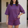 Violet FJØRNA women's summer two-piece striped co-ord set with twist front design on top and matching shorts.