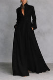 FJØRNA white maxi dress with stand collar, buttons, and long sleeves, elegant and flowing for a sophisticated look.