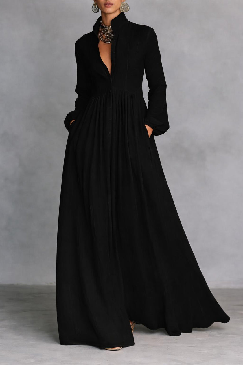 FJØRNA white maxi dress with stand collar, buttons, and long sleeves, elegant and flowing for a sophisticated look.