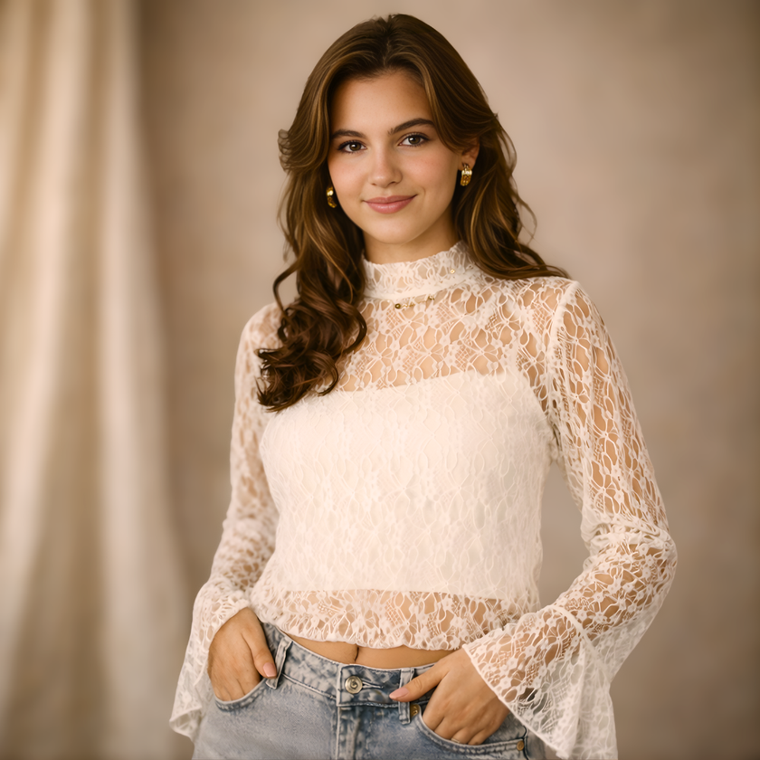 White lace top with a mock neck and flared sleeves, designed for women by FJØRNA.