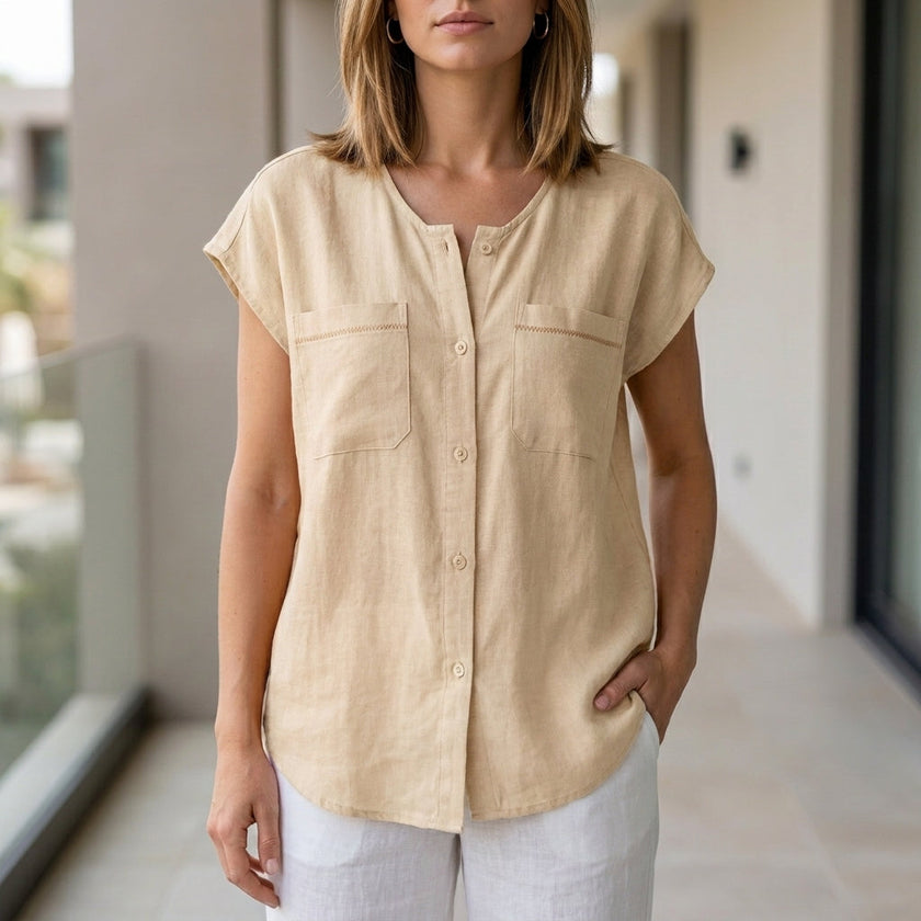 White FJØRNA women's sleeveless V-neck summer blouse, lightweight top with a stylish V-neck design.