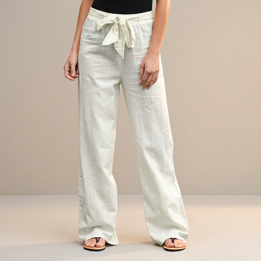 White women's summer trousers by FJØRNA featuring high waist and cotton fabric, perfect for casual warm-weather wear.