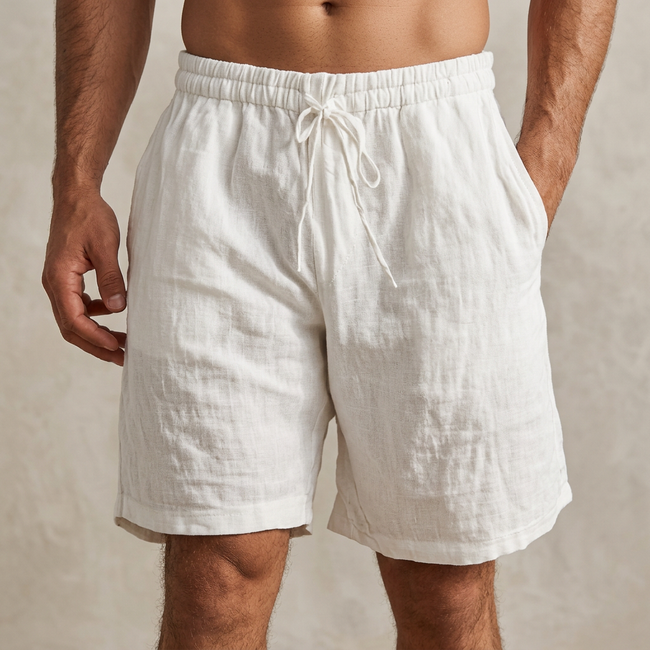 White men's casual drawstring shorts with side pockets, FJØRNA brand, lightweight and comfortable for everyday wear.