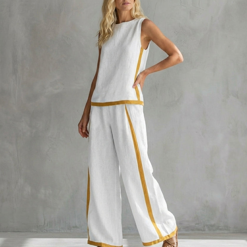 White women's summer two-piece co-ord set with slit details, stylish and comfortable for warm weather from FJØRNA.
