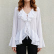 White women's summer blouse with bell sleeves and denim fabric by FJØRNA, featuring a relaxed fit and stylish design.