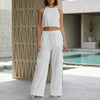 White FJØRNA halter top and wide-leg lounge set, stylish 2-piece ensemble with relaxed fit and comfortable fabric.