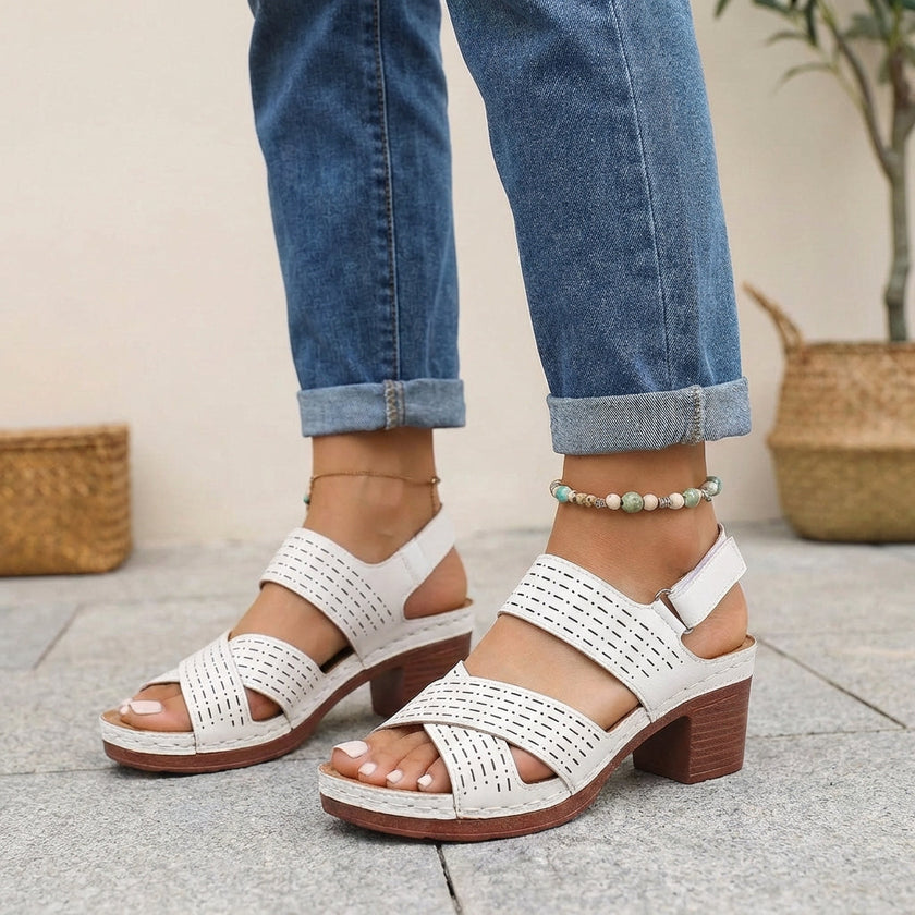 White FJØRNA orthopedic criss-cross slingback platform sandals for women with block heels and open toes.