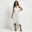 FJØRNA satin halter neck wrap maxi dress with bow tie waist and ruffled hem, white color, elegant evening dress.