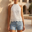 White floral halter neck summer blouse for women by FJØRNA, stylish top with a feminine design and lightweight fabric.