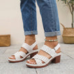 FJØRNA white orthopedic platform block heel sandals with open toe and cut-out design, showcasing stylish and supportive footwear.