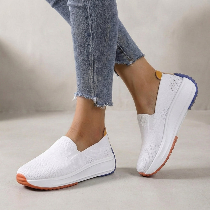 White FJØRNA women's orthopedic sneakers with knit upper and arch support for comfortable, supportive footwear.