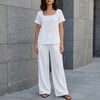 FJØRNA Coastal Breeze relaxed white top and wide-leg pant set, casual 2-piece outfit with soft fabric and comfortable fit.