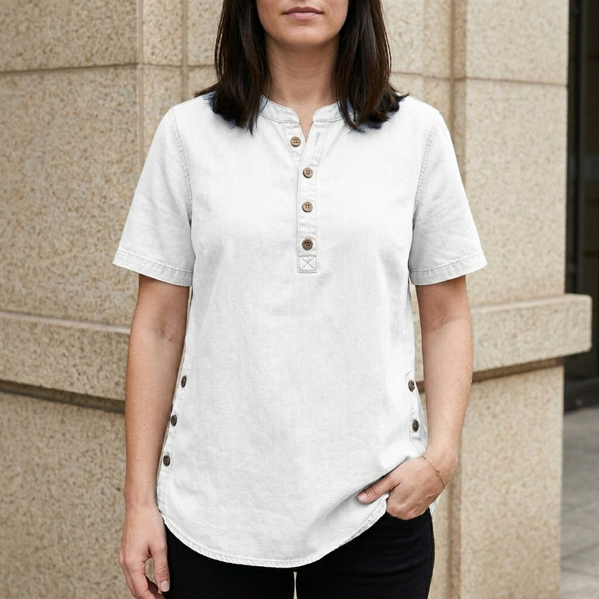 White denim summer top for women with button-front from FJØRNA, styled with a casual, lightweight design.