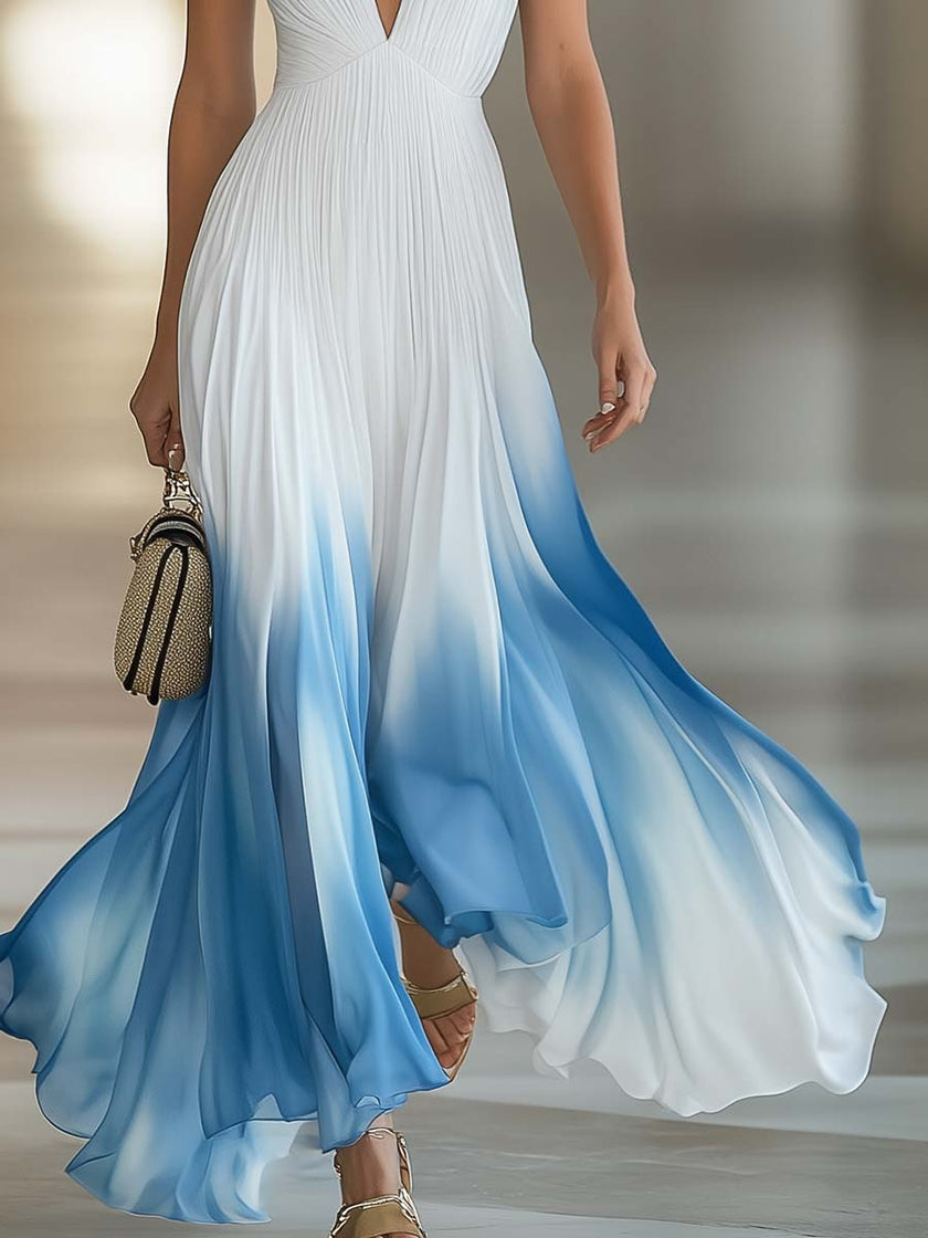 White chiffon V-neck maxi dress by FJØRNA, flowing evening dress with elegant design and lightweight fabric.