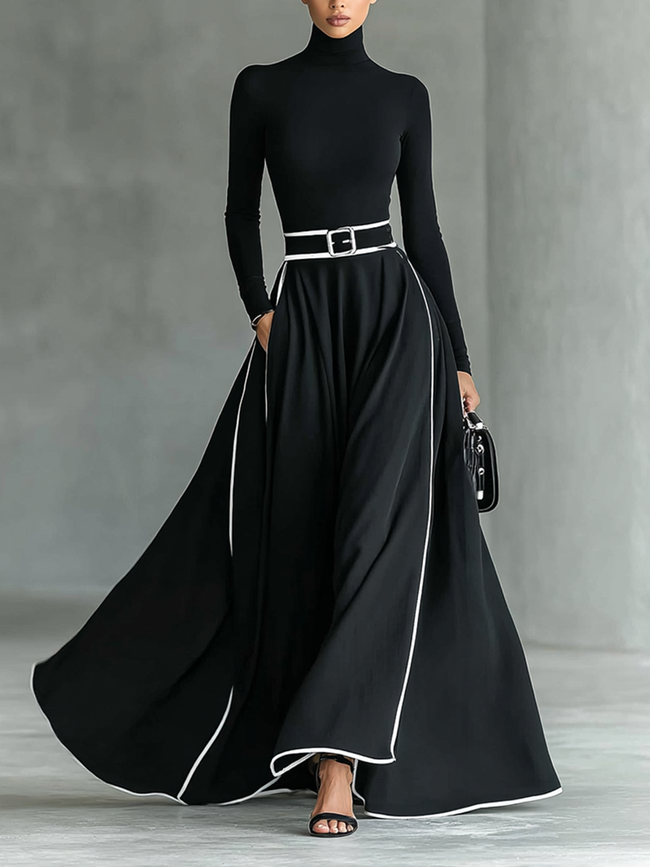 White long sleeve maxi dress for women by FJØRNA, flowing fabric, fitted waist, and elegant design perfect for casual or formal wear.