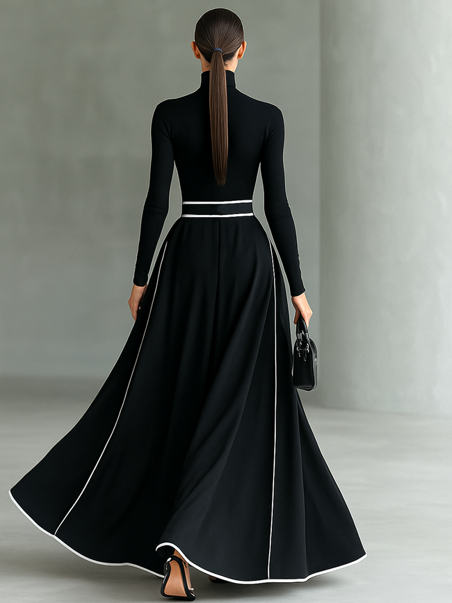 White FJØRNA long sleeve maxi dress for women, flowing fabric, full-length with a fitted waist and elegant design.