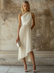 White pleated midi evening dress by FJØRNA, featuring elegant pleats and a flowing silhouette, perfect for formal occasions.