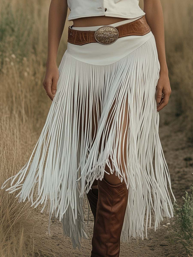 White suede tassel dress by FJØRNA featuring a casual style with fringe tassels and a relaxed fit.