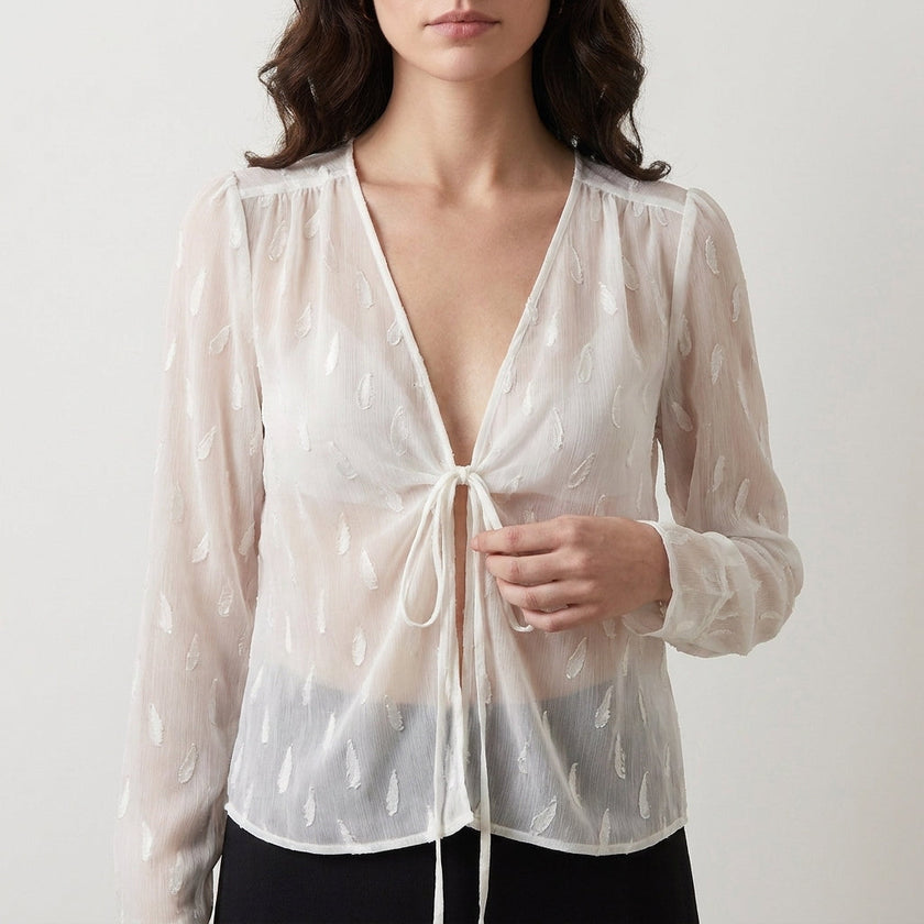 White FJØRNA women's summer blouse with V-neck and long sleeves, made of denim fabric, stylish and lightweight for warm weather.