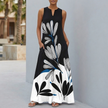 White FJØRNA relaxed fit floral sleeveless maxi dress with pockets, flowing fabric and a casual, comfortable style for women.