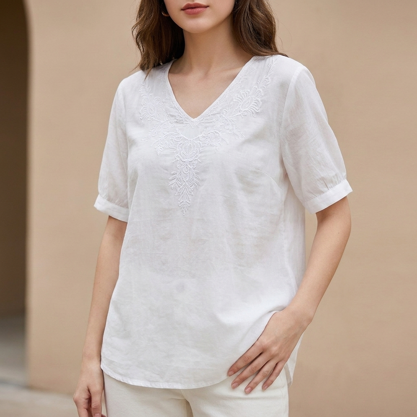 White floral linen summer blouse for women with V-neck, casual style by FJØRNA, perfect for warm weather.