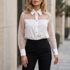 White FJØRNA summer women's blouse with mesh fabric and button front, stylish lightweight top for warm weather.