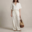 White FJØRNA zip-neck top and wide-leg trouser 2-piece set, casual stylish outfit with comfortable, relaxed fit.