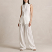 FJØRNA white sleeveless high-neck two-piece set with flowing wide-leg trousers, elegant and sophisticated outfit for women.