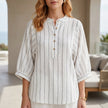 White striped linen summer blouse for women with button front, stylish and breathable FJØRNA women's top.