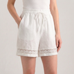 White FJØRNA elegant mini dress for women with drawstring linen fabric, featuring a stylish and casual dress design.