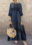 Women wearing a khaki plaid maxi dress with half sleeves and ruffle details, by FJØRNA, showcasing a stylish O-neck design.
