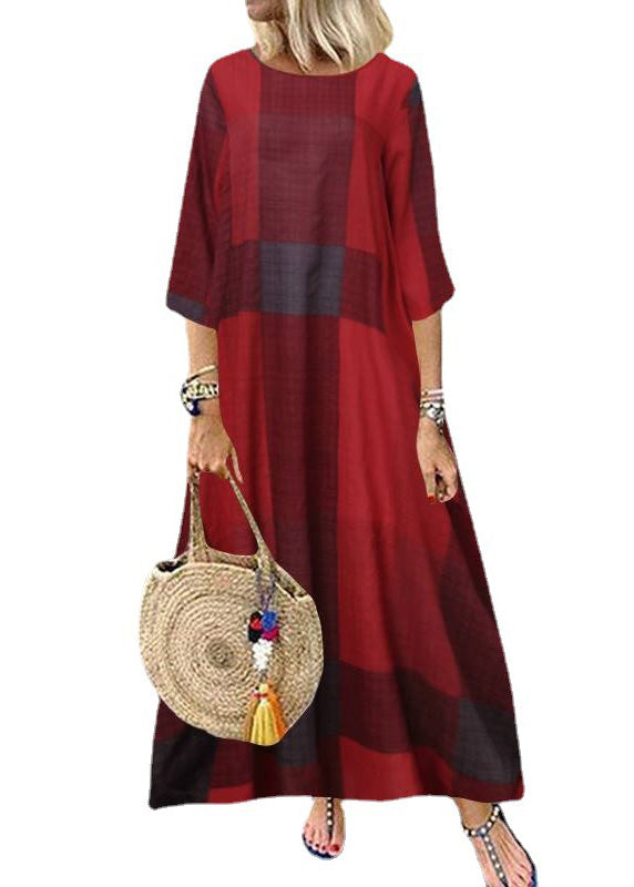 Women wearing FJØRNA khaki plaid maxi dress with O-neck, half sleeves, and ruffle details, styled as a casual summer dress.
