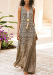 Women wearing a khaki V-neck patchwork print sleeveless long dress by FJØRNA, suitable for parties and evening events.