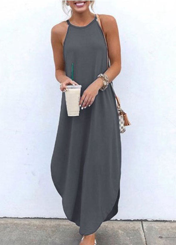 Women wearing a white sleeveless straps high-low hem casual maxi dress by FJØRNA, showing the flowing fabric and stylish design.