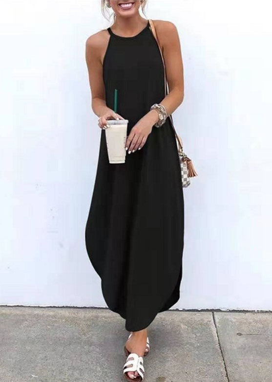 Women wearing a white sleeveless straps high-low hem casual maxi dress by FJØRNA, showcasing a flowing, elegant design.