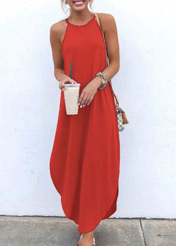 Women wearing a white FJØRNA sleeveless maxi dress with straps and a high-low hem, casual style, perfect for warm weather.