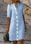 Women’s white stand collar cotton dress with buttons and half sleeves, casual elegant style by FJØRNA.