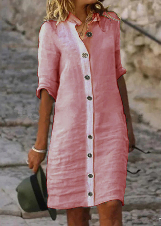 Elegant white FJØRNA cotton dress with stand collar, button details, and half sleeves, perfect for casual or semi-formal wear.