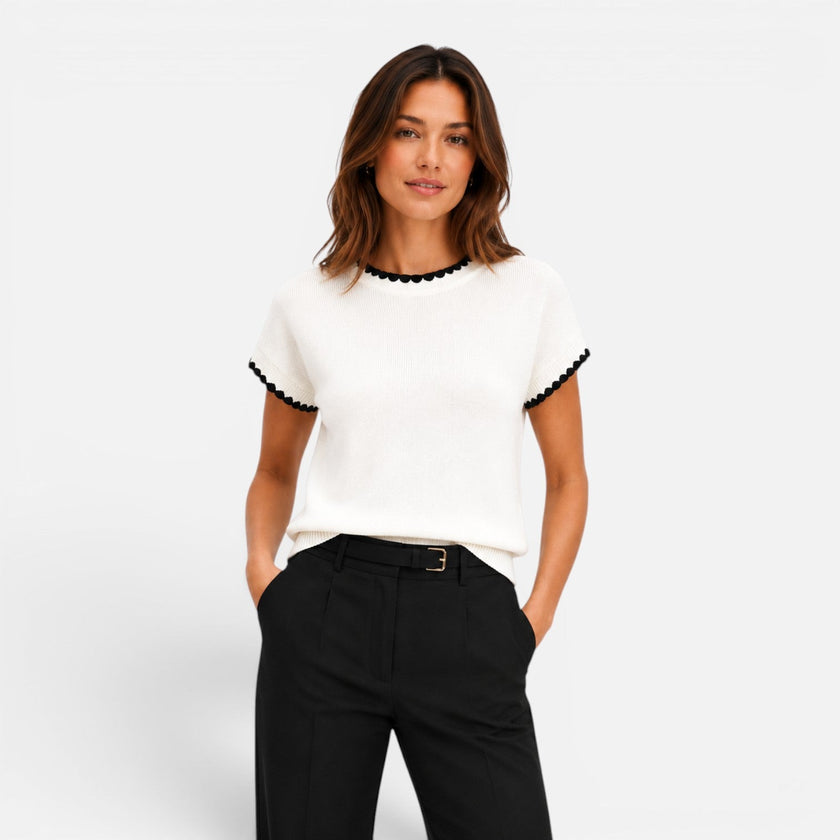 Women’s FJØRNA contrast trim knit top with short sleeves and crew neck, showcasing a stylish, casual women’s shirt.