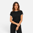 Women’s contrast trim knit top with short sleeves and crew neck by FJØRNA, styled with a casual, fitted look.