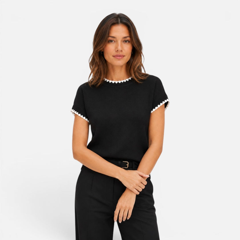 Women’s contrast trim knit top with short sleeves and crew neck by FJØRNA, styled with a casual, fitted look.