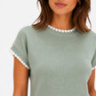 Women's FJØRNA contrast trim knit top with short sleeves and crew neck, featuring stylish color accents and soft knit fabric.