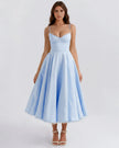 FJØRNA women's midi dress featuring a fitted corset top and flowing tulle skirt, elegant evening wear for special occasions.