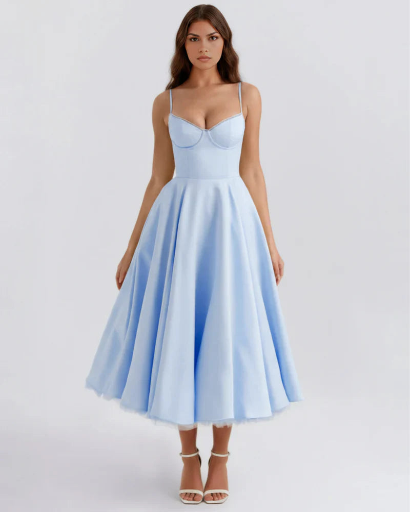 FJØRNA women's midi dress featuring a fitted corset top and flowing tulle skirt, elegant evening wear for special occasions.