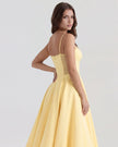 Women’s corset midi dress with tulle skirt by FJØRNA, featuring a fitted bodice and flowing layered tulle for a stylish look.