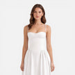 Women’s elegant strap A-line midi dress by FJØRNA, perfect for wedding guests, featuring a sophisticated design and flowing fabric.