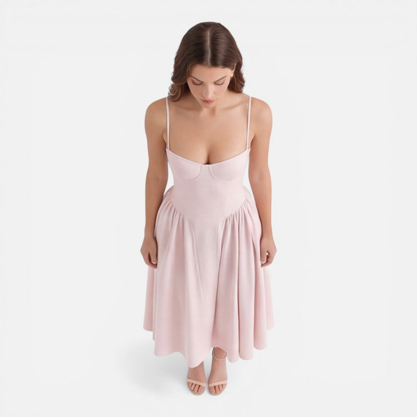 FJØRNA women's elegant midi A-line dress with straps, perfect for wedding guests, shown in a stylish, flowing design.